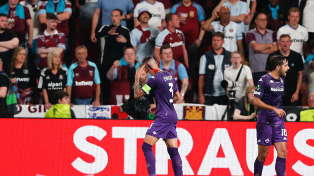 Fiorentina captain Cristiano Biraghi pictured with blood flowing from a cut on his head after being struck by an object thrown by West Ham fans during the 2023 UEFA Europa Conference League final